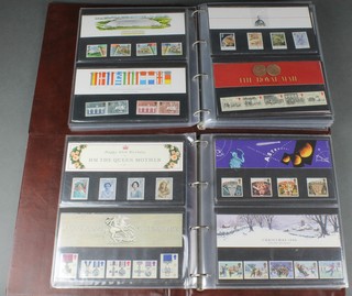 4 albums of various GB presentation stamps 