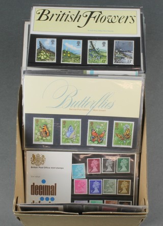 A box of various GB presentation stamps 