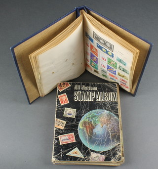 A Trusty stamp album, an All Nations stamp album, an Ace Herald stamp album and 2 others 