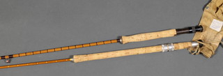 Walker Brampton, a split cane fly rod together with a Dixon Sons 7' split cane spinning rod with sleeve 