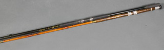 A float rod together with a Tony Cokes 12' carp fishing rod 