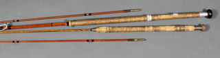 C Barlow & Co Ltd. A twin section fishing rod, a J S Sharpe 3 section fishing rod with spare tips 