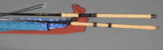A Daiwa Sensor 9' carbon fibre spinning rod, a Daiwa match winner carbon fibre 3 section fishing rod with 2 spare tips