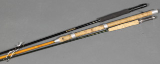 Tunbridge Wells Rods, a 3 section fiberglass fishing rod, a  Bob Church twin section carbon fibre fly rod, a Normark black medallion 2 section carbon fibre fly rod