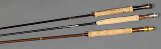 A Hardys graphite deluxe twin section fly rod together with a Greys Montana carbon fibre fishing rod and 1 other 