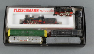 A Fleischmann N gauge locomotive, 3 Trix N gauge double headed diesel locomotives together with an N gauge locomotive and 2 tank engines 