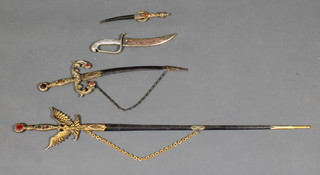 A reproduction court sword with 27" blade together with 3 other reproduction daggers 