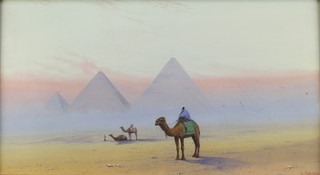 L Simora, watercolour, a study of camels and riders before pyramids, signed 9 1/2" x 18" 