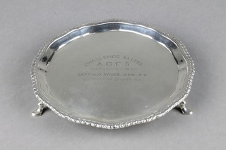A silver card tray with gadrooned rim on pad feet, London 1933, 150 grams 6 1/2" 