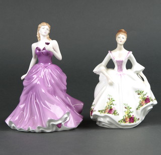 2 Royal Doulton figures - Country Rose HN3221 7" and Victoria HN4629 8" 
