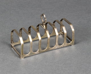 A silver 7 bar toast rack, Chester 1939, 64 grams 