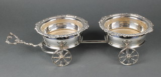 An Edwardian silver plated 2 section coaster wagon with gadrooned decoration 