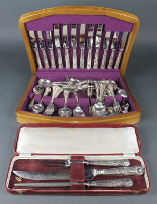 A silver plated canteen of Kings Pattern cutlery, a cased carving set 