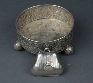 A Continental silver plated bottle stand on ball feet, a ditto purse 