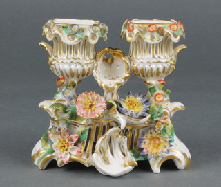 A Paris porcelain centrepiece with urns and floral decoration on a rococo base 5" 