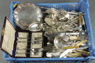 A silver plated card tray and a quantity of silver plated cutlery 