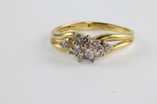 An 18ct yellow gold diamond ring, size I 1/2