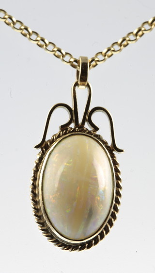 An opal set pendant on a 9ct gold necklace