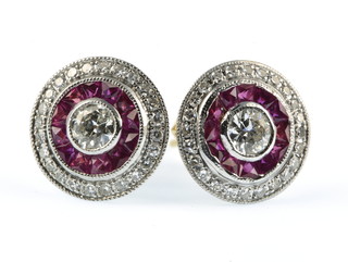 A pair of 18ct yellow gold Art Deco style ruby and diamond target ear studs 