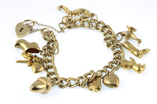 A 9ct gold double link charm bracelet 20 grams 