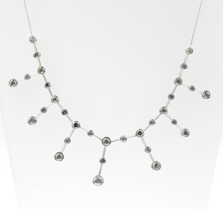 An 18ct white gold 31 stone diamond drop necklace, approx. 6ct 