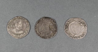 Early coins, a James I shilling, a Charles I shilling, a Commonwealth shilling