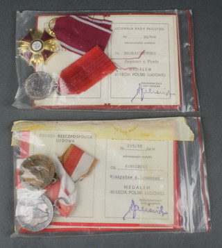5 Polish medals together with associated documents