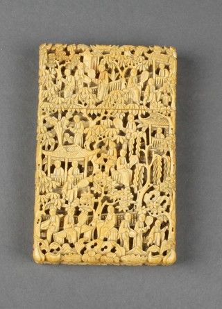 A profusely carved Cantonese card case with figures in pavillion and garden landscapes 4" x 2 1/2" 