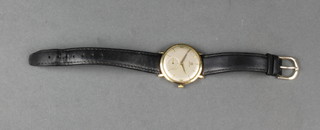 A gentleman's gilt cased Omega wristwatch with seconds at 6 0'clock 