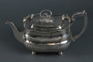 A George III demi-fluted silver teapot with serpent handle and presentation inscription on ball feet, Dublin 1808, gross 800 grams 