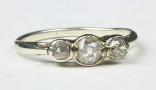 An 18ct white gold 3 stone diamond ring, size K 1/2
