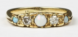 A Victorian 18ct gold opal 3 and diamond 2 stone ring, size J