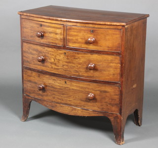 A 19th Century mahogany bow front chest of 2 short and 2 long drawers with tore handles, raised on splayed bracket feet 35"h x 35 1/2"w x 19 1/2"d