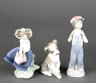 A Lladro figure of a young boy wearing dungarees 8", a ditto of a girl holding a basket of flowers 7" and a seated figure of a hound 4" 