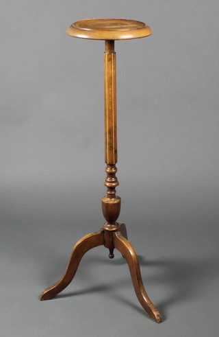 An Edwardian circular inlaid mahogany jardiniere stand, raised on pillar and tripod supports 38"h x 11" diam.