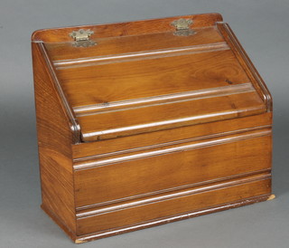 An Edwardian Art Nouveau walnut wedge shaped stationery box, the hinged lid revealing a fitted interior 11"h x 13"w x 6"d  