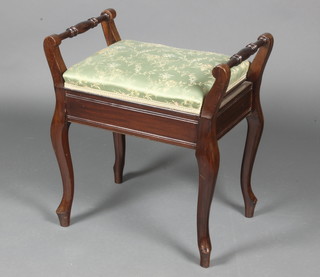 An Edwardian mahogany piano stool with hinged lid, raised on cabriole supports 24"h x 20"w x 14"d