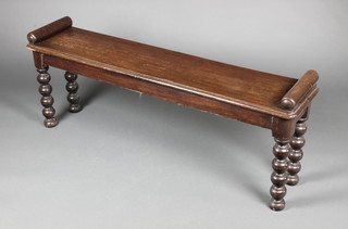 A Victorian rectangular mahogany hall bench with scroll ends, raised on turned supports 20"h x 51"l x 11 1/2"d 