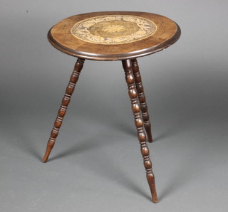 A Victorian circular mahogany and poker work gypsy table, the top inlaid flowers and raised on 3 turned supports 23"h x 19"diam. 