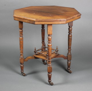 An Edwardian walnut octagonal 2 tier occasional table on turned supports 29"h x 27 1/2"w x 27 1/2"d 