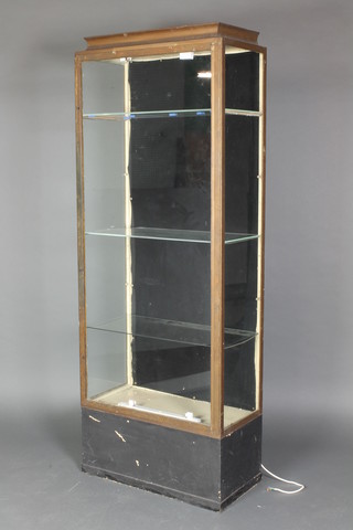 An Art Deco gilt metal shop display cabinet, the interior fitted 3 shelves enclosed by panelled door with shaped top 73h"x 28"h x 14"h 