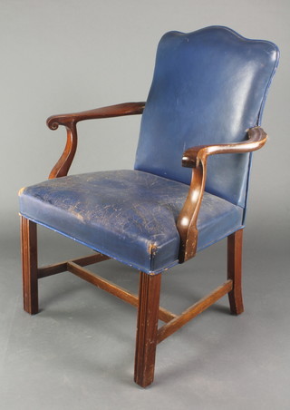 A Georgian style mahogany open arm library chair, the seat and back upholstered in blue leather, raised on square tapering supports with H framed stretcher