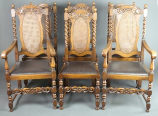 A set of 6 1930's Carolean style oak dining chairs with carved and pierced cresting rails with woven cane backs and upholstered drop in seats, raised on turned and block supports with box stretcher, 2 carvers, 4 standard