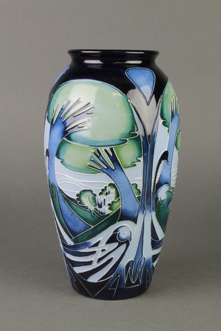 A Moorcroft Collectors Club oviform vase decorated with stylised trees in a coastal landscape by Sian Leepers 10", boxed 