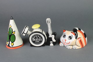 A Lorna Bailey Art Deco style shaker, a novelty teapot and a model of a cat 