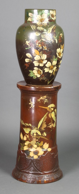 An early 20th Century Studio Ceramics green ground oviform vase decorated with stylised flowers 18" and a similar brown glazed jardiniere stand 23" 