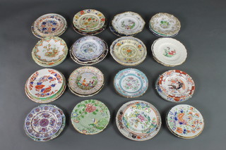 A quantity of Victorian Ironstone and other decorative plates