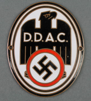 An oval radiator badge with eagle and Swastika marked D.D.A.C. the reverse marked Ges.Gesch 4" 