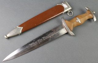 An SA dagger with engraved blade and metal scabbard, the blade marked Aug Meftenwer Solingen GR 