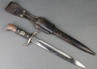 A side arm with 9 1/2" single edge blade complete with metal scabbard 